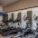 Large well lit fitness center 